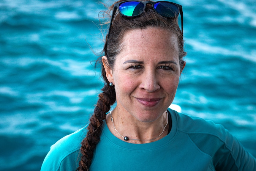 headshot of woman on a boat.