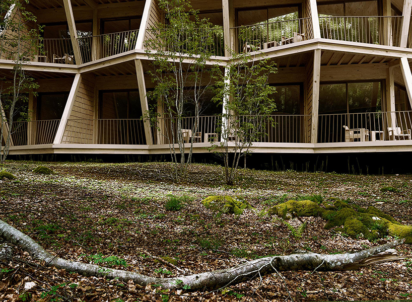fragmented timber volumes compose forested mountain housing by arup in albania - 10