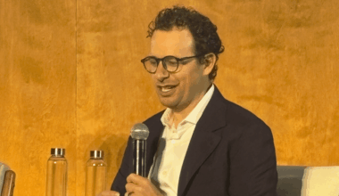 Dario Amodei spent last year warning of an AI white-collar bloodbath. Now he's changing the narrative