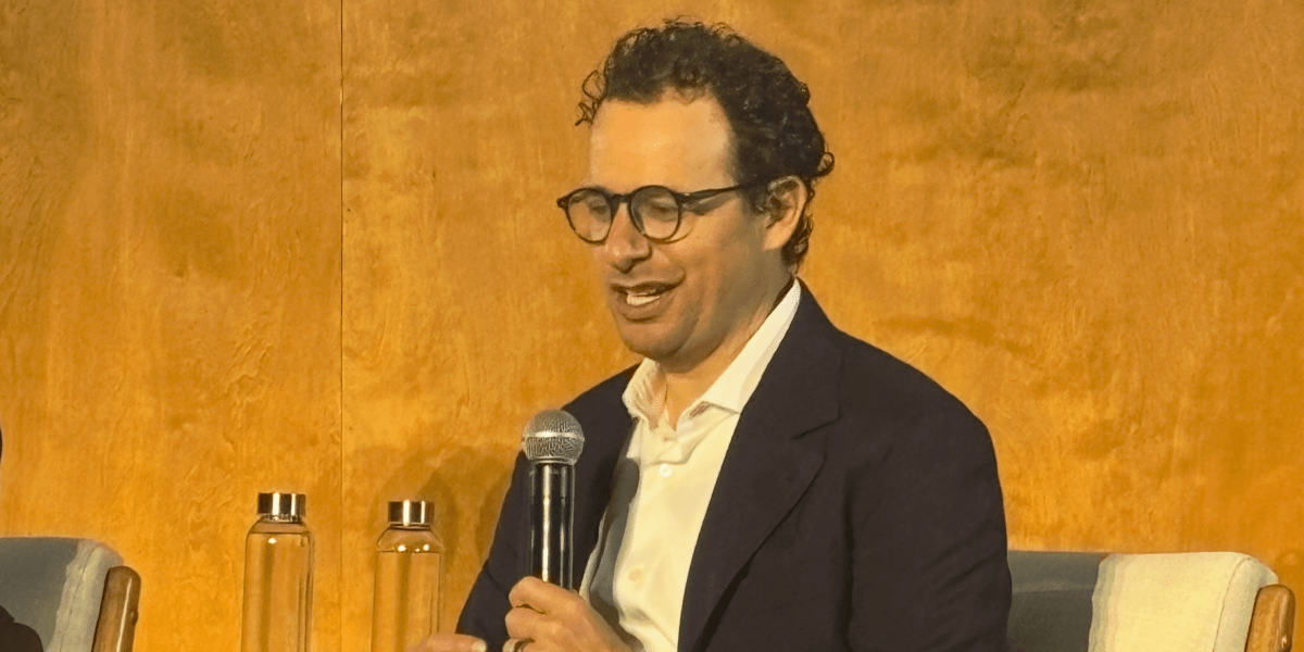 Dario Amodei spent last year warning of an AI white-collar bloodbath. Now he's changing the narrative