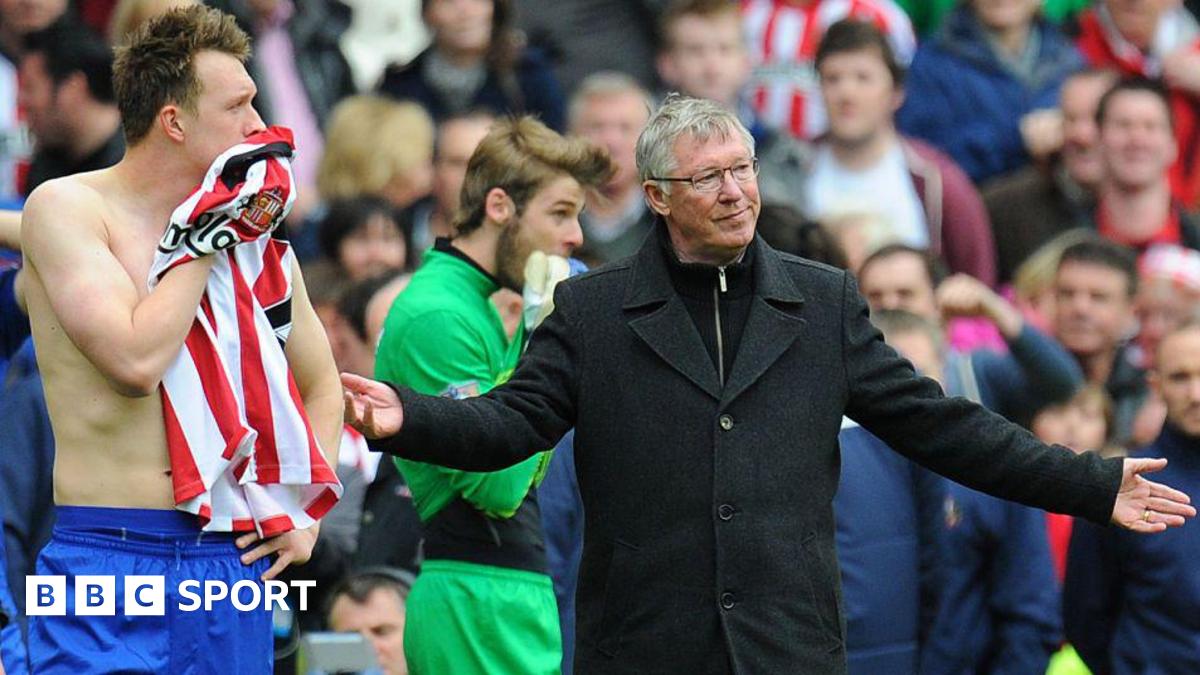 Phil Jones and Sir Alex Ferguson look on in despair