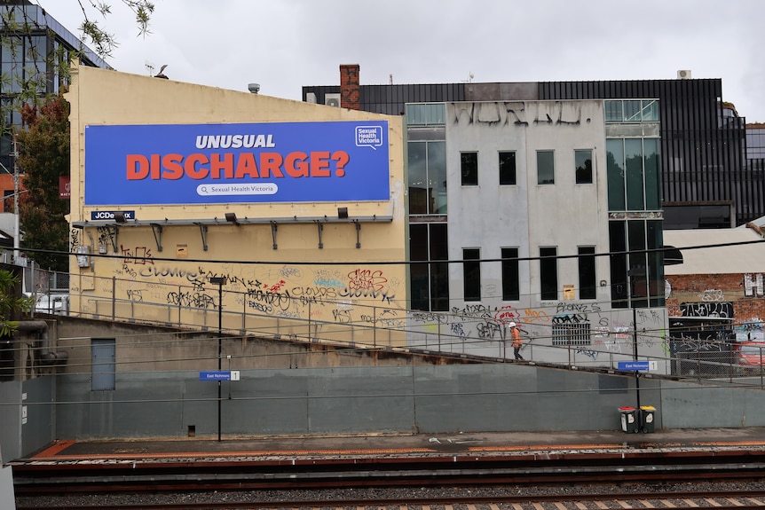A billboard promoting sexual health awareness
