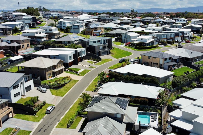 A drone shot of rows of houses in Shell Cove, Wollongong's south.