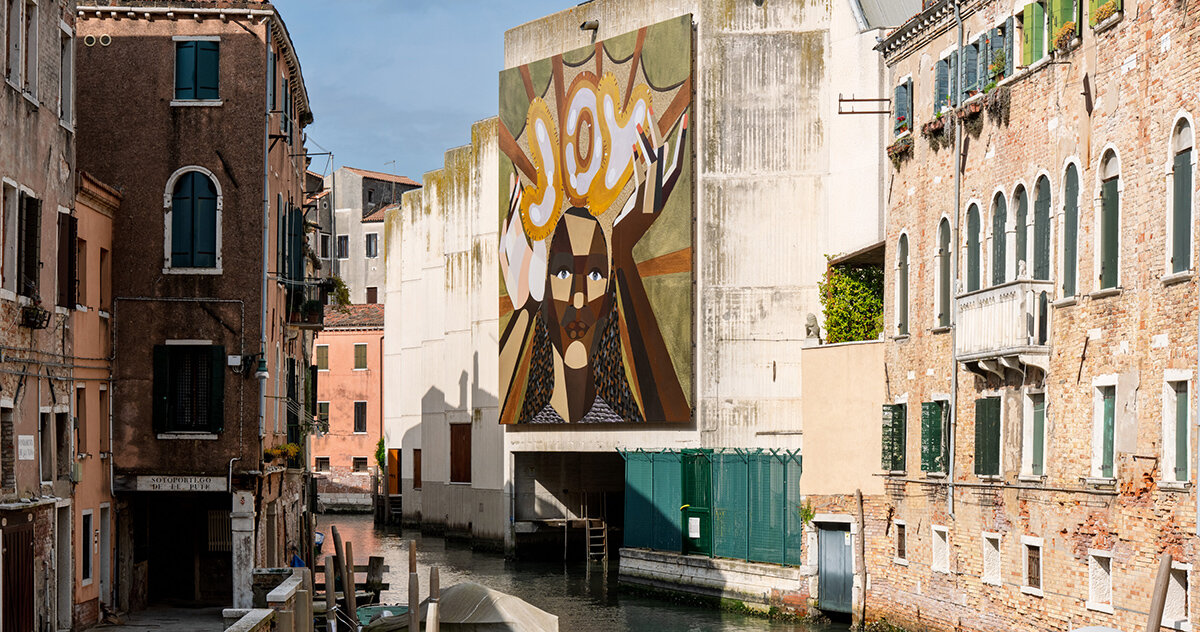 massive portrait of koyo kouoh by derrick adams appears in venice