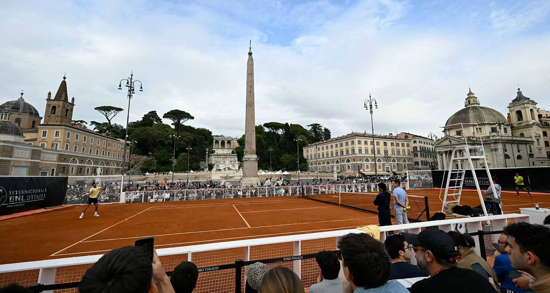 Novak Djokovic hit on a temporary clay tennis court at Piazza del Popolo in Rome on Tuesday.