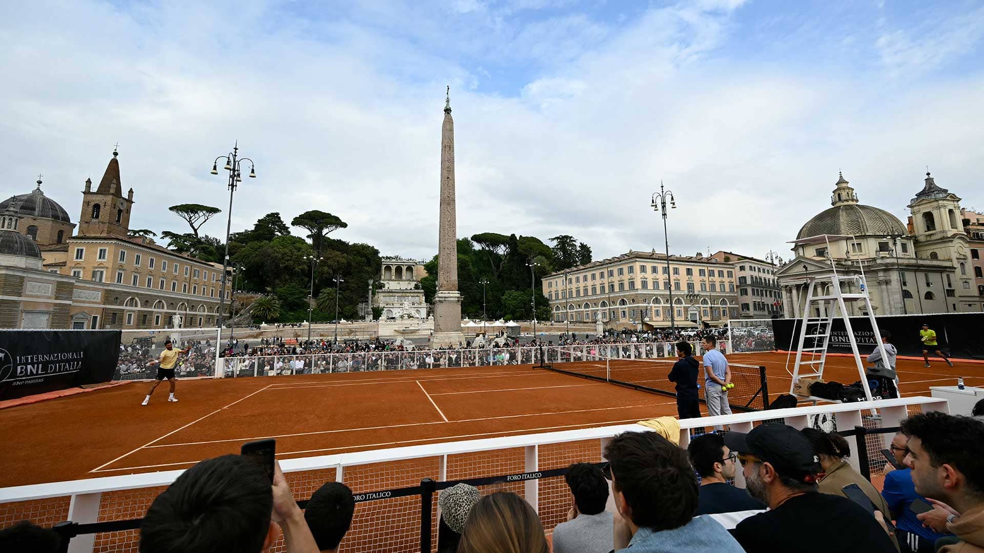 Novak Djokovic hit on a temporary clay tennis court at Piazza del Popolo in Rome on Tuesday.