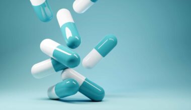 Falling pills in a blue background.