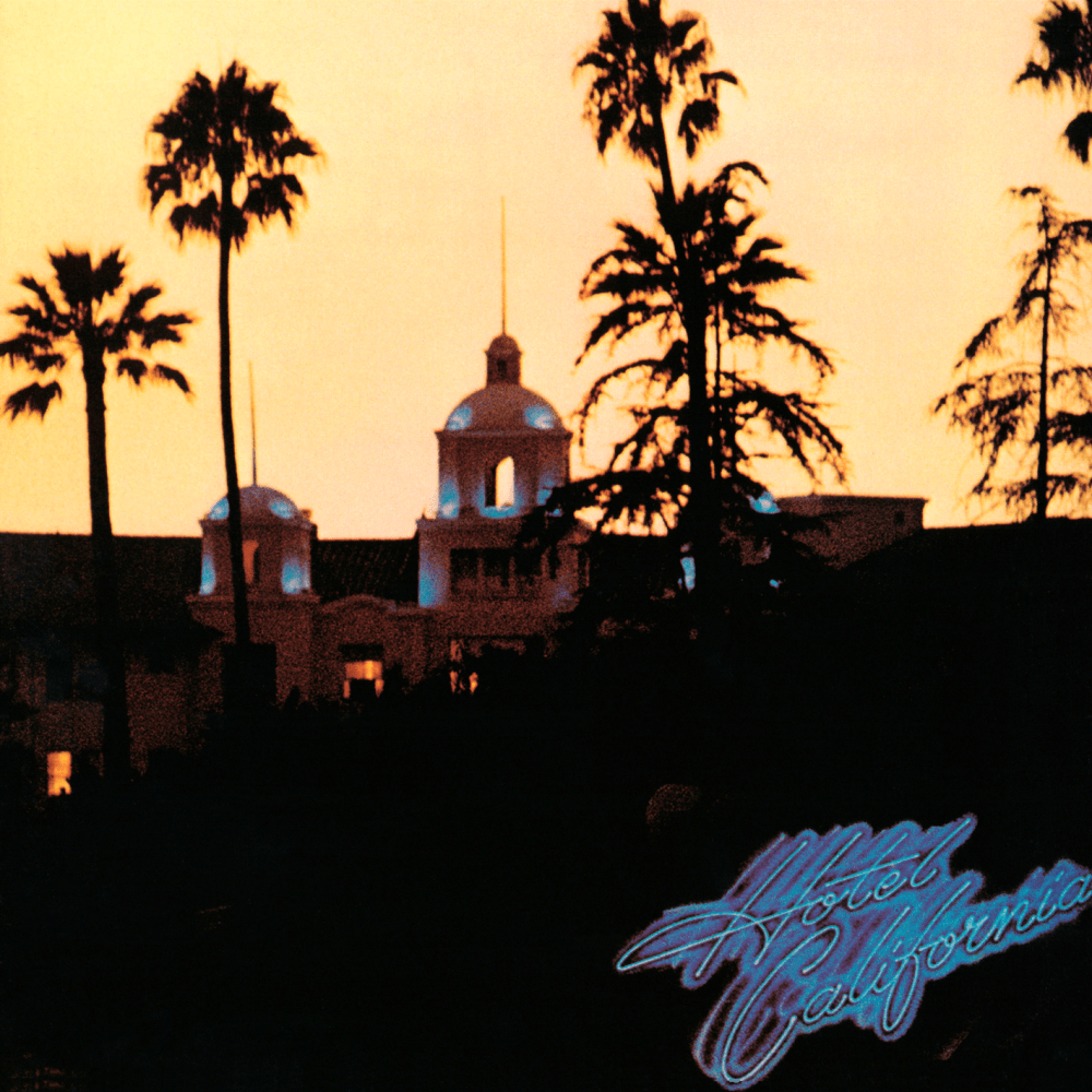 Album cover featuring a hotel and palm trees at dusk