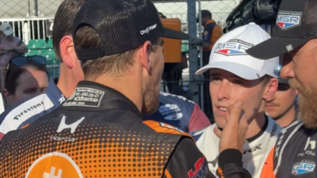 Romain Grosjean confronts Marcus Armstrong.