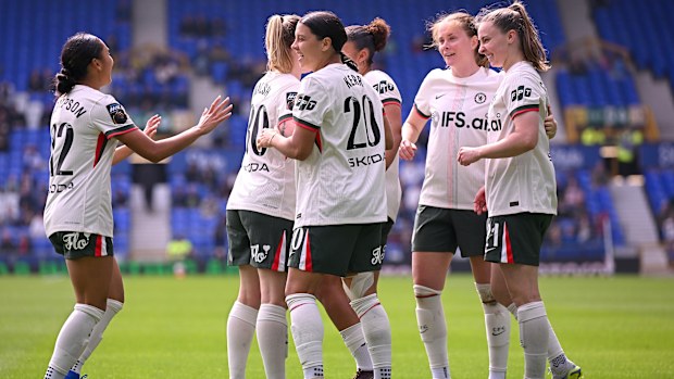Sam Kerr of Chelsea (centre) celebrates scoring her team's second goal.
