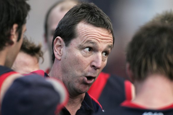 Neale Daniher makes a point as Melbourne coach in 2004.