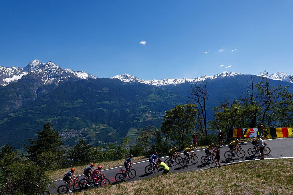 The pack rides during the 14th stage of the Giro d'Italia 2026 - Tour of Italy cycling race between Aosta and Pila (Gressan), Italy, on May 23, 2026.