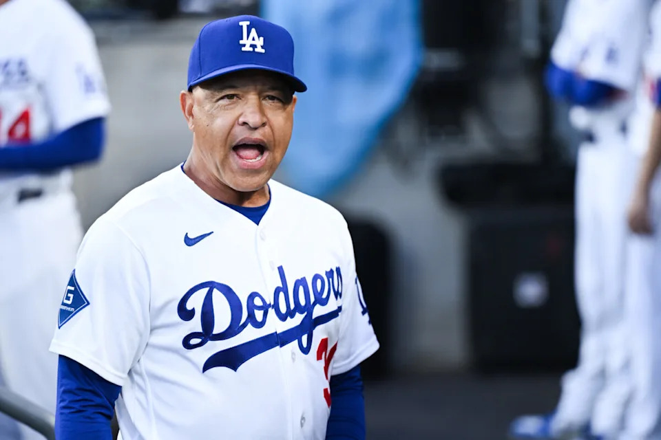 Apr 24, 2026; Los Angeles, California, USA; Los Angeles Dodgers manager Dave Roberts (30) speaks in the dugout before the game against the Chicago Cubs at Dodger Stadium. Mandatory Credit: William Liang-Imagn Images