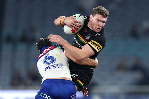 SYDNEY, AUSTRALIA - APRIL 09: Liam Martin of the Panthers is tackled during the round six NRL match between the Canterbury Bulldogs and Penrith Panthers at Accor Stadium on April 09, 2026 in Sydney, Australia. (Photo by Cameron Spencer/Getty Images)
