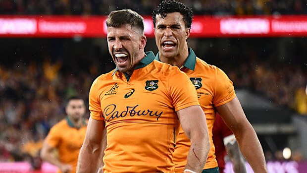 Jake Gordon of the Wallabies celebrates scoring a try with Joseph-Aukuso Suaalii.