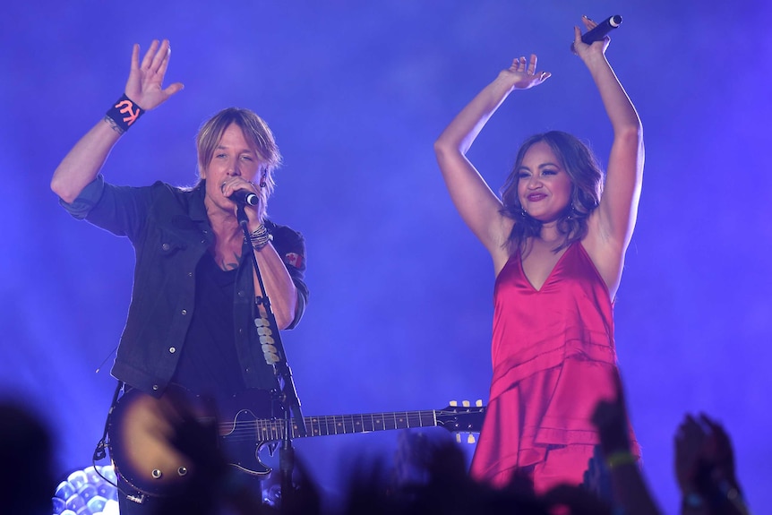 Keith Urban and Jessica Mauboy at the NRL grand final