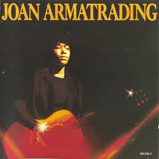 Album cover featuring a woman playing guitar