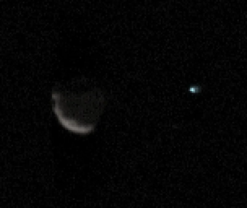 A view of Mars moon Phobos (left) and Earth (right captured from the surface of Mars by NASA's Curiosity rover. Credit: NASA/JPL-Caltech/MSSS