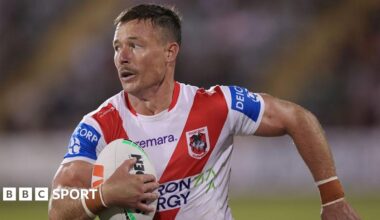 Damien Cook carrying the ball for St George Illawarra Dragons