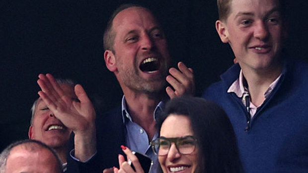 Prince William, Prince of Wales celebrates a goal.