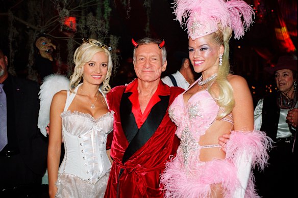 Holly Madison (left), pictured with Hugh Hefner and Anna Nicole Smith in 2004.