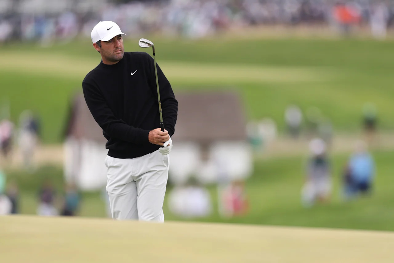 NEWTOWN, PENNSYLVANIA - MAY 15: Scottie Scheffler of the United States chips onto the ninth green during the second round of the PGA Championship at Aronimink Golf Club on May 15, 2026 in Newtown, Pennsylvania. (Photo by Carl Recine/Getty Images)