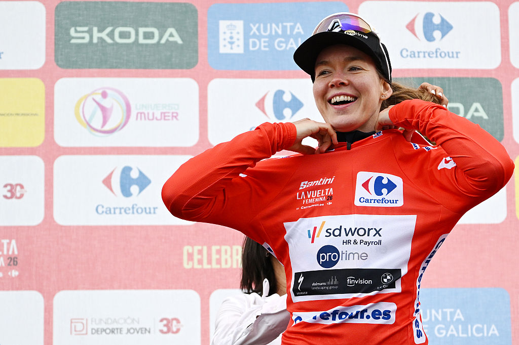 NAVA, SPAIN - MAY 08: Anna van der Breggen of Netherlands and Team SD Worx - Protime celebrates at podium as Red Leader Jersey winner during the 12th La Vuelta Femenina 2026, Stage 6 a 106.5km stage from Gijon / Xixon to Les Praeres. Nava 738m / #UCIWWT / on May 08, 2026 in Nava, Spain. (Photo by Szymon Gruchalski/Getty Images)