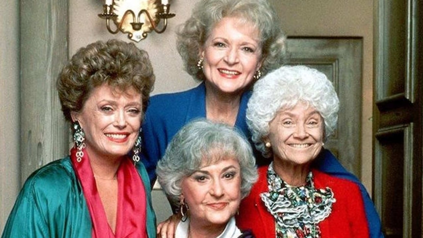 The cast of TV series The Golden Girls smile as they pose for the camera.