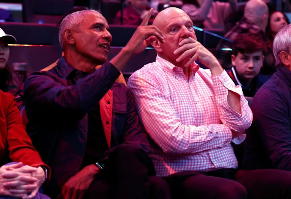 Barack Obama, the 44th President of the United States talks to LA Clippers owner Steve Balmer during the third quarter between the Clippers and the Detroit Pistons at Intuit Dome. Mandatory Credit: Jason Parkhurst-Imagn Images