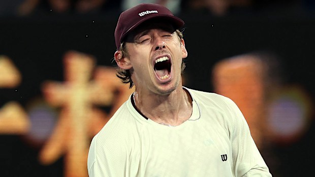 Alex de Minaur of Australia celebrates winning against Frances Tiafoe of the United States.