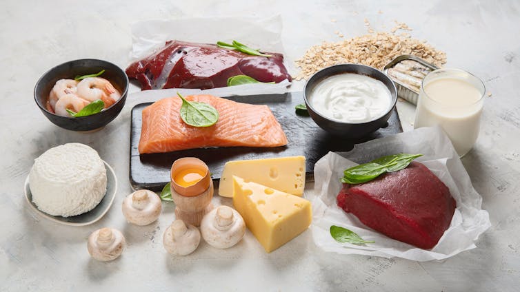 Selection of dairy products, meats and vegetables that contain vitamin B12