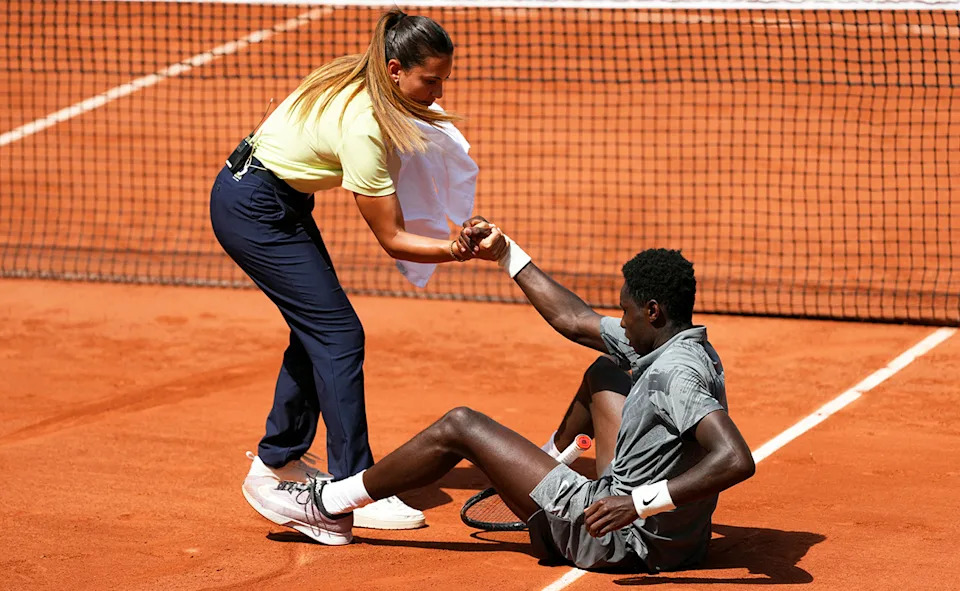 Ana Carvalho, pictured here helping Moise Kouame after a fall.