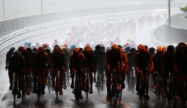 A general view of the peloton competing while it is raining heavily during the 109th Giro d'Italia 2026, Stage 5