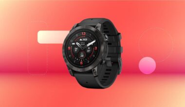 A black smartwatch against a red gradient CNET background.