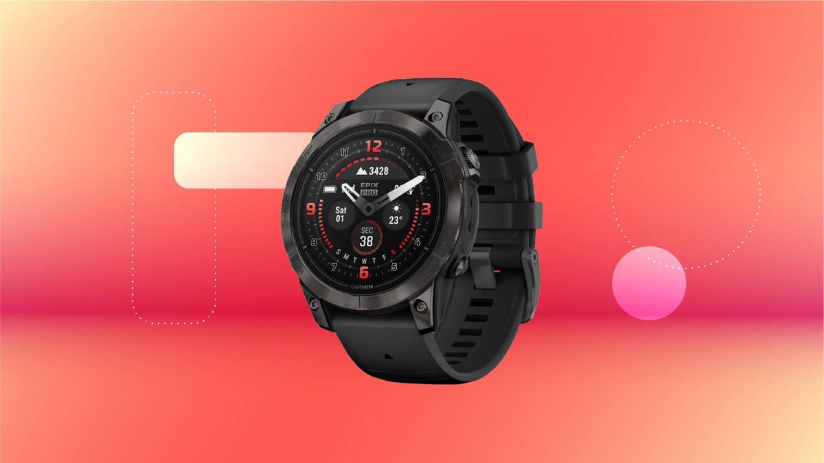 A black smartwatch against a red gradient CNET background.
