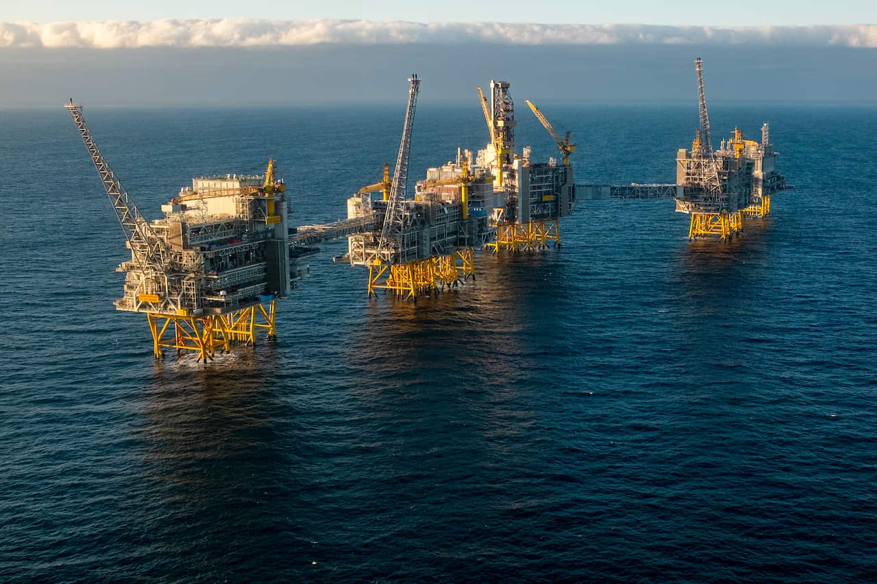 Four oil platforms in the ocean