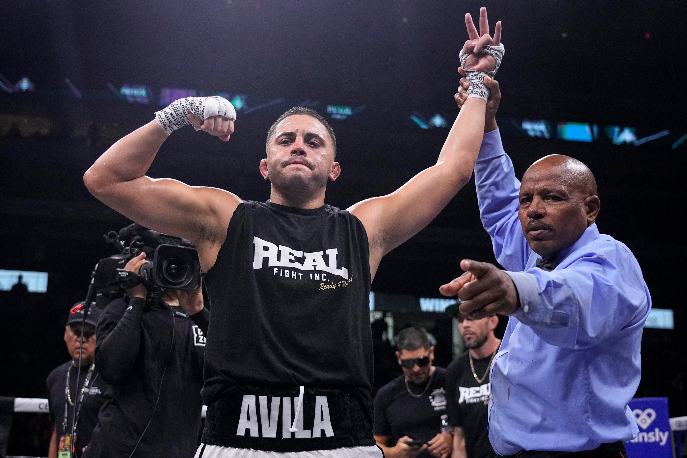 DALLAS, TEXAS - AUGUST 05: Chris Avila gestures to the crowd after defeating Jeremy Stephens by decision at the American Airlines Center on August 05, 2023 in Dallas, Texas. (Photo by Sam Hodde/Getty Images)