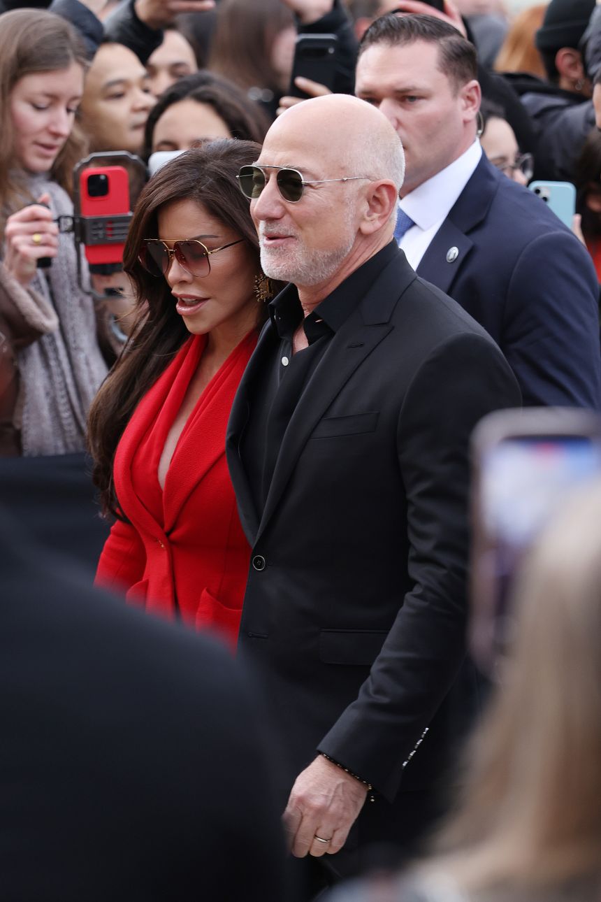 Jeff Bezos and Lauren Sánchez Bezos arrive at Schiaparelli during Paris Couture Week in January.