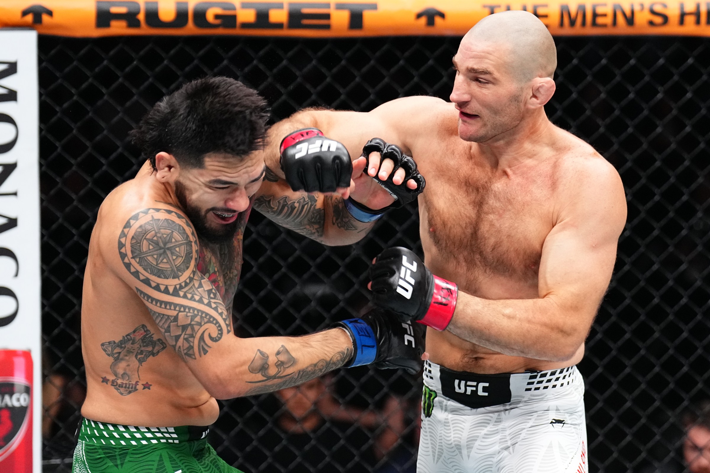 HOUSTON, TEXAS - FEBRUARY 21: (R-L) Sean Strickland punches Anthony Hernandez in a middleweight fight during the UFC Fight Night event at Toyota Center on February 21, 2026 in Houston, Texas. (Photo by Chris Unger/Zuffa LLC)