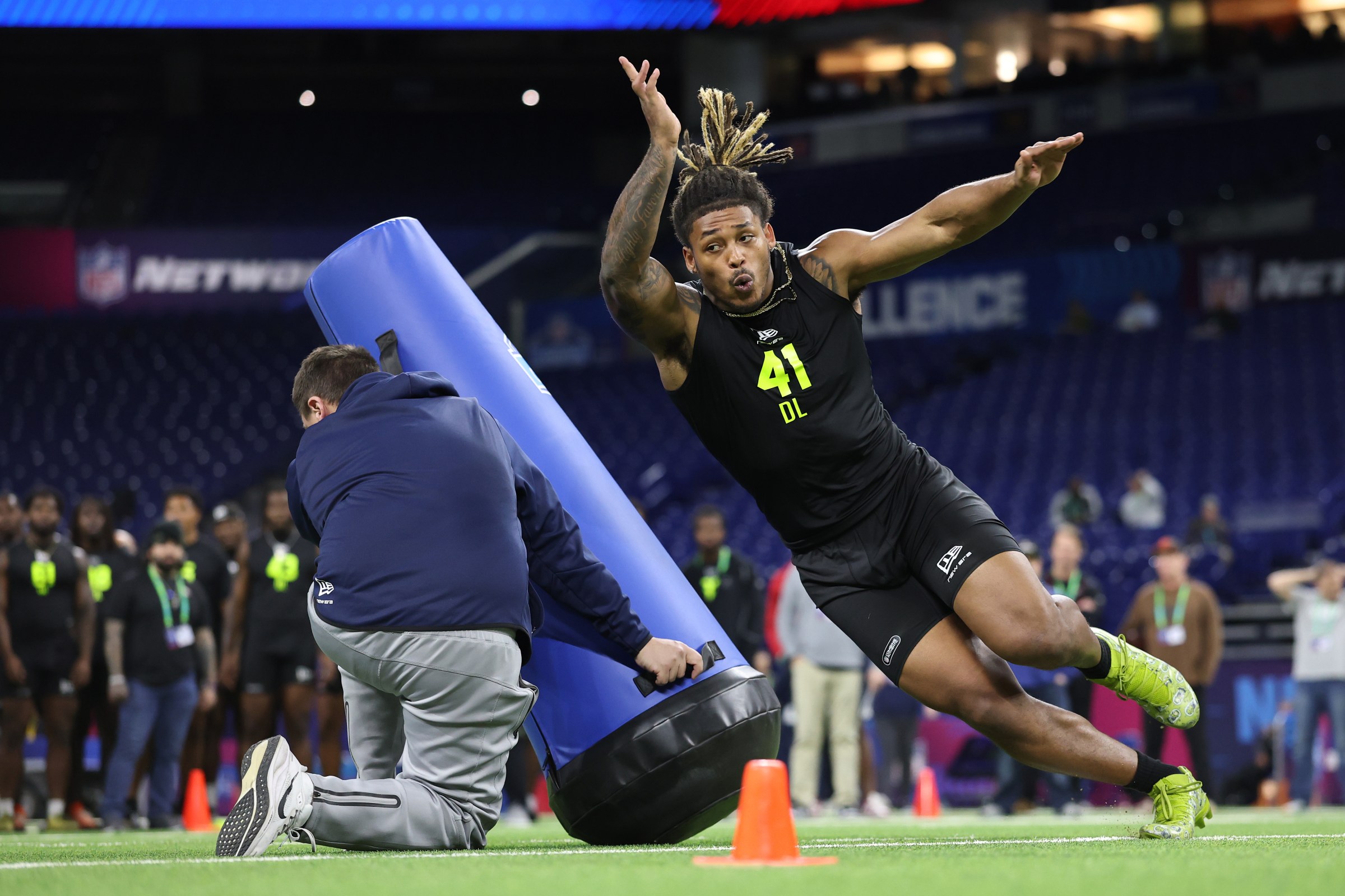 INDIANAPOLIS, INDIANA - FEBRUARY 26: Cashius Howell of the Texas A&M Aggies participates in a drill during the 2026 NFL Scouting Combine at Lucas Oil Stadium on February 26, 2026 in Indianapolis, Indiana. (Photo by Stacy Revere/Getty Images)