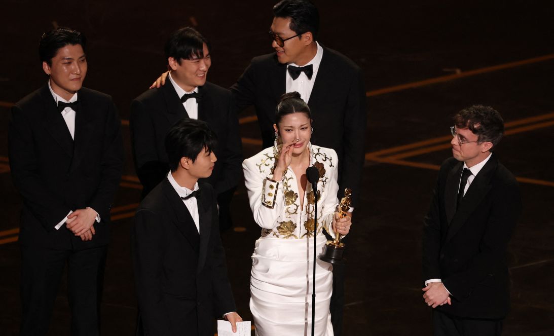 Ejae accepts the Oscar for Best Music (Original Song) for