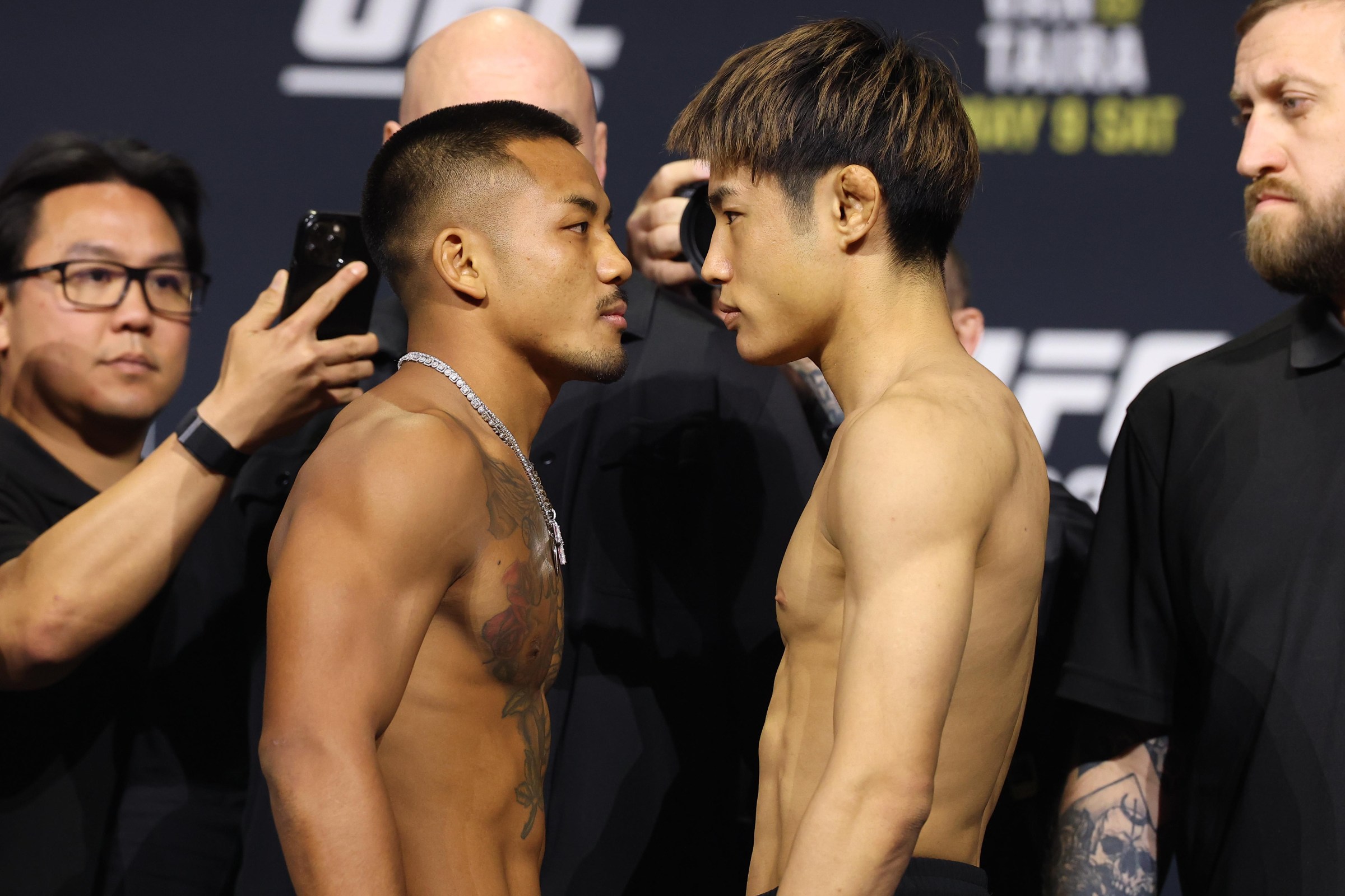 NEWARK, NEW JERSEY - MAY 08: (L-R) Opponents Joshua Van of Myanmar and Tatsuro Taira of Japan face off during the UFC 328 ceremonial weigh-in at Prudential Center on May 08, 2026 in Newark, New Jersey. (Photo by Ed Mulholland/Zuffa LLC)