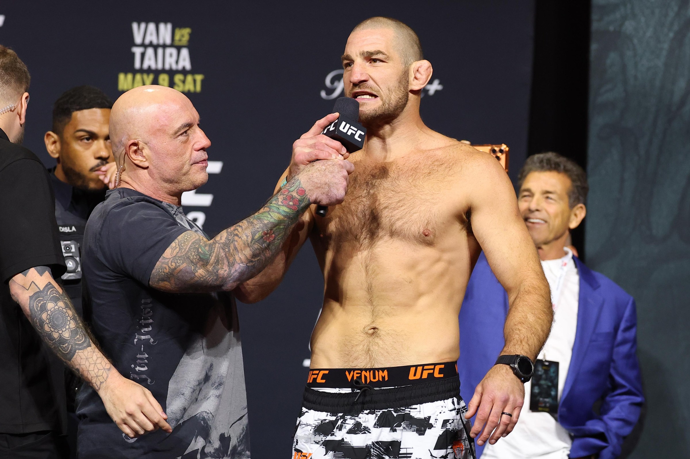 NEWARK, NEW JERSEY - MAY 08: Sean Strickland is interviewed by Joe Rogan during the UFC 328 ceremonial weigh-in at Prudential Center on May 08, 2026 in Newark, New Jersey. (Photo by Ed Mulholland/Zuffa LLC)