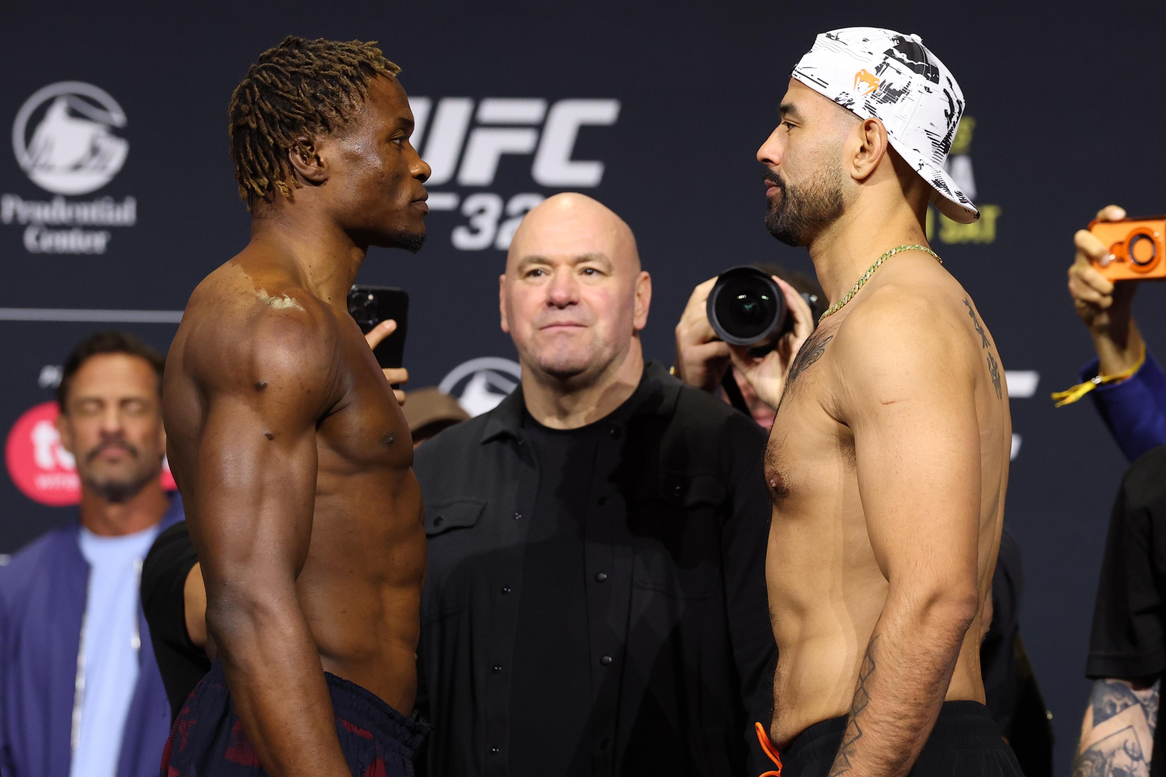 NEWARK, NEW JERSEY - MAY 08: (L-R) Opponents Ateba Gautier of Cameroon and Ozzy Diaz face off during the UFC 328 ceremonial weigh-in at Prudential Center on May 08, 2026 in Newark, New Jersey. (Photo by Ed Mulholland/Zuffa LLC)