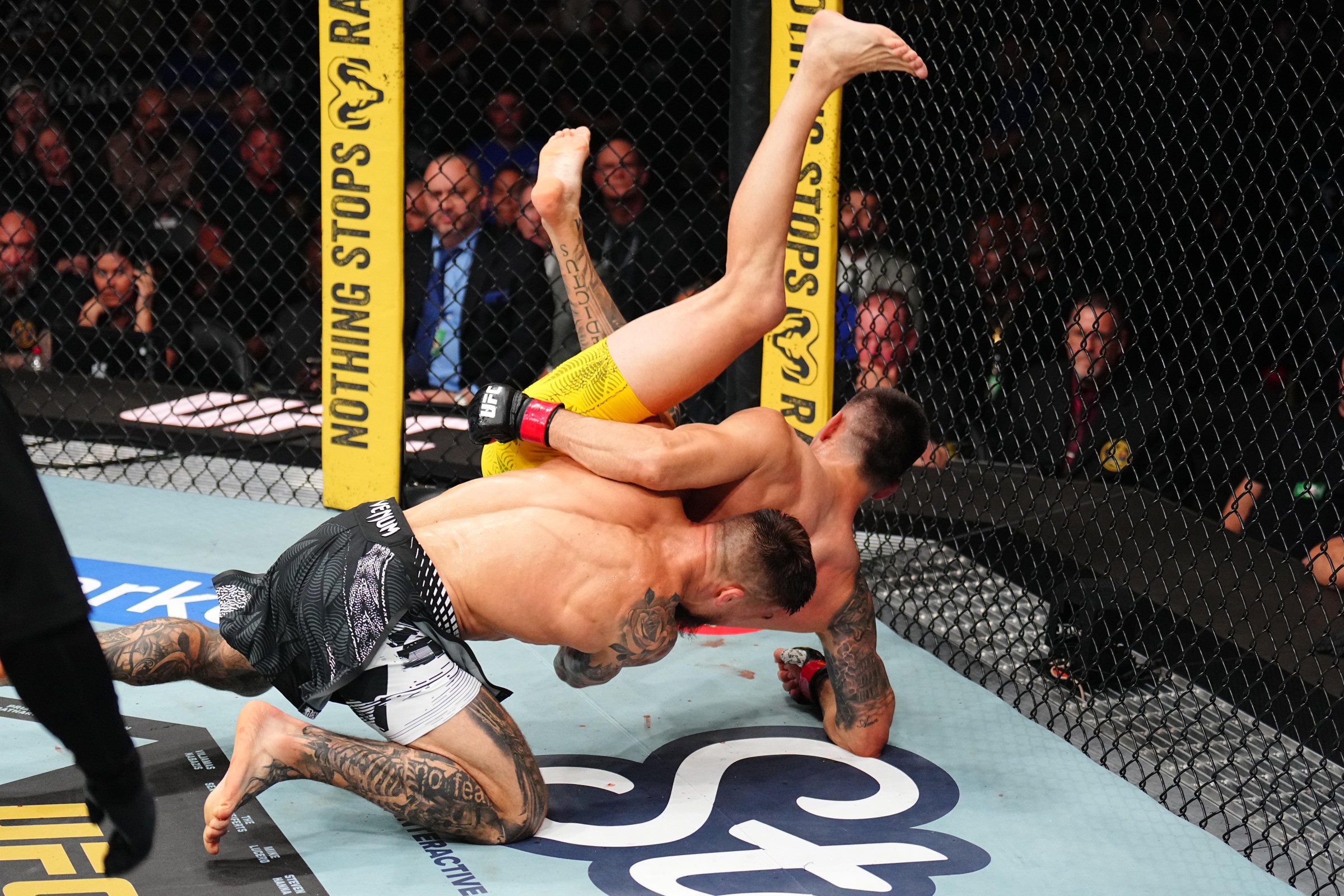 NEWARK, NEW JERSEY - MAY 09: (L-R) Yaroslav Amosov of Ukraine takes down Joel Alvarez of Spain in a welterweight fight during the UFC 328 event at Prudential Center on May 09, 2026 in Newark, New Jersey. (Photo by Chris Unger/Zuffa LLC)