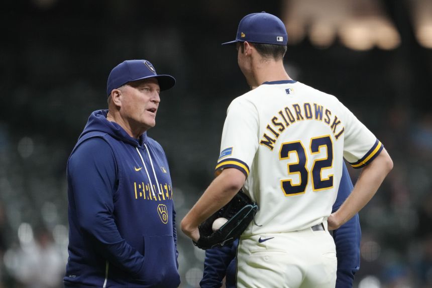 Milwaukee's Pat Murphy, last year's National League Manager of the Year, talks with pitcher Jacob Misiorowski during a game on May 13.