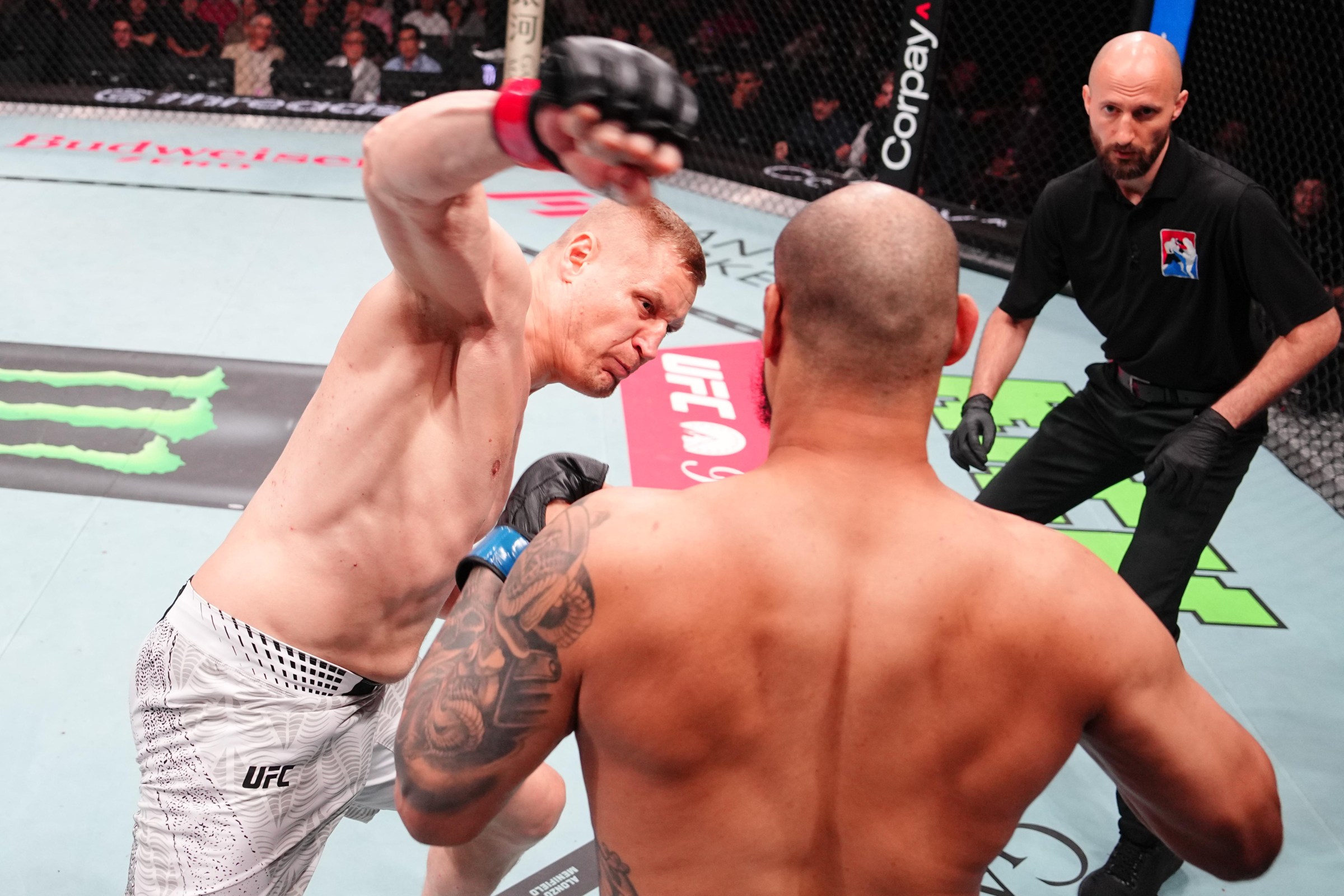 MACAU, CHINA - MAY 30: Sergei Pavlovich of Russia punches Tallison Teixeira of Brazil in a heavyweight fight during the UFC Fight Night event at Galaxy Arena on May 30, 2026 in Macau, China. (Photo by Jeff Bottari/Zuffa LLC)