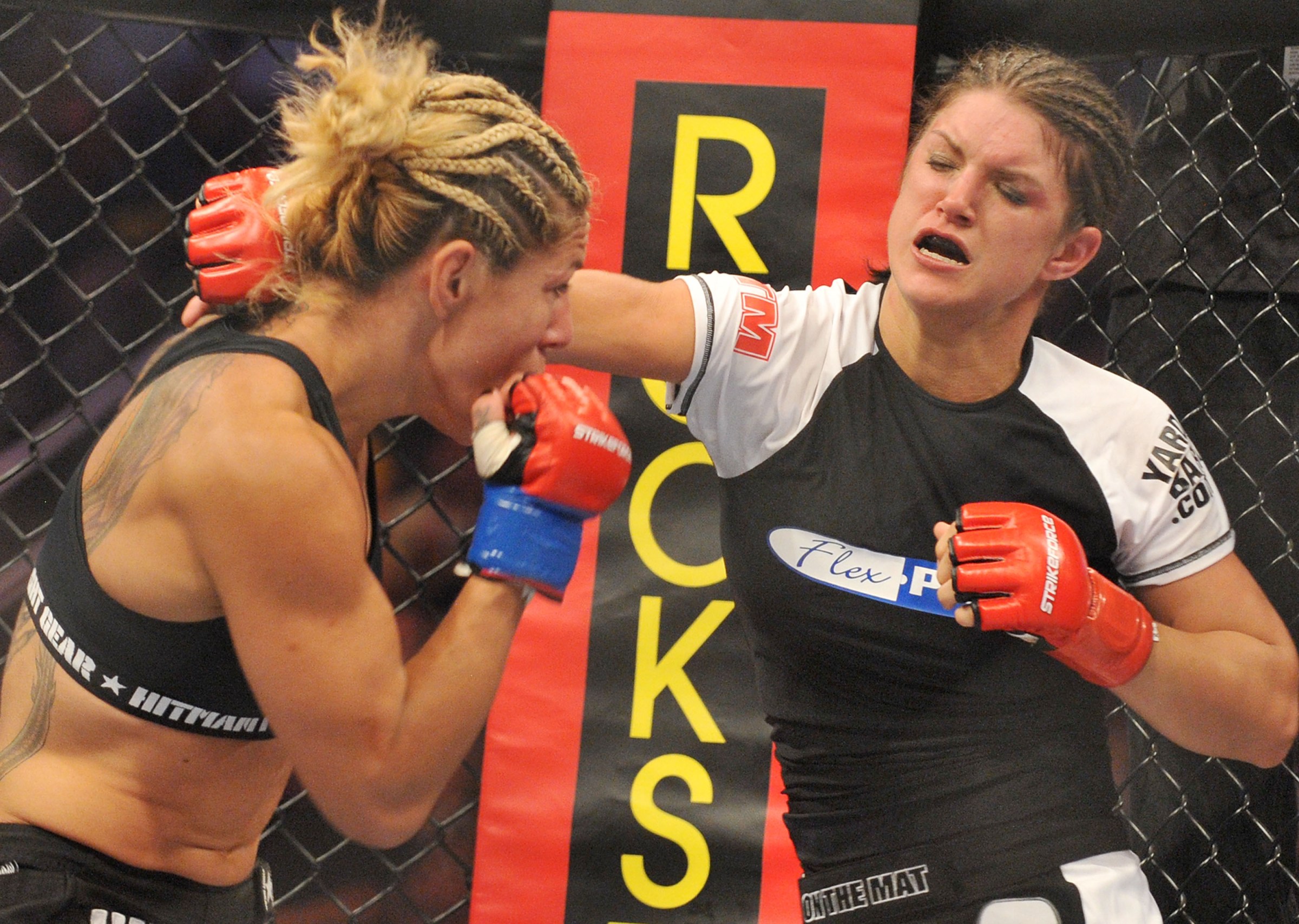 SAN JOSE, CA - AUGUST 15: Cris Cyborg (L) battles Gina Carano during their Middleweight Championship fight at Stikeforce: Carano vs. Cyborg on August 15, 2009 in San Jose, California. (Photo by Jon Kopaloff/Getty Images)