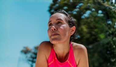 Tired mature woman sweating during sports activity
