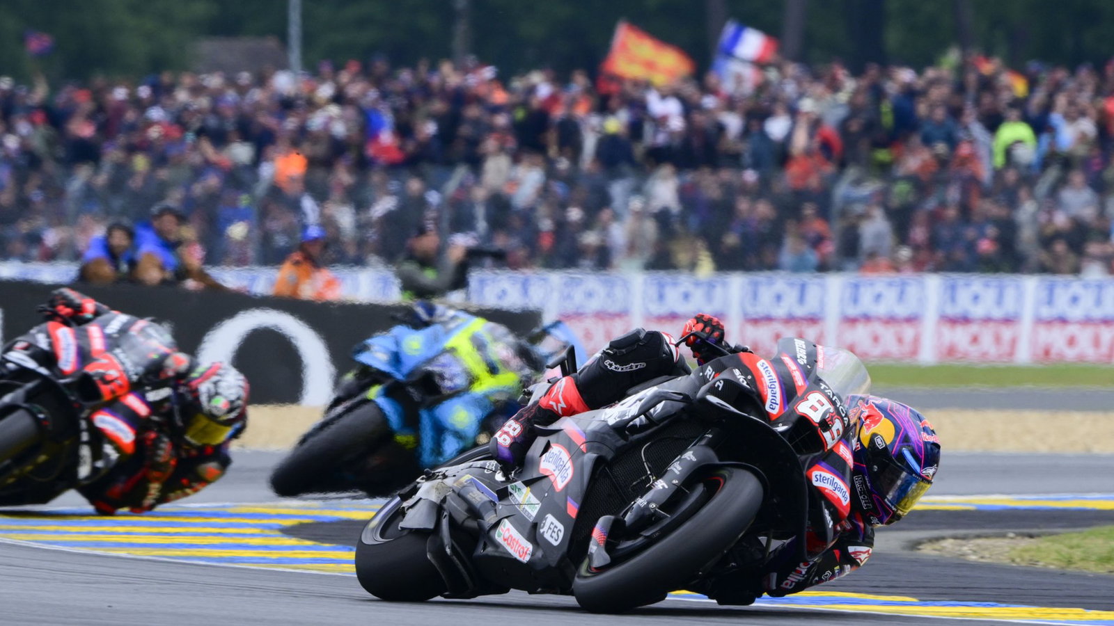 Jorge Martin leads Marco Bezzecchi, Ai Ogura, 2026 MotoGP French Grand Prix. Credit: Gold and Goose.